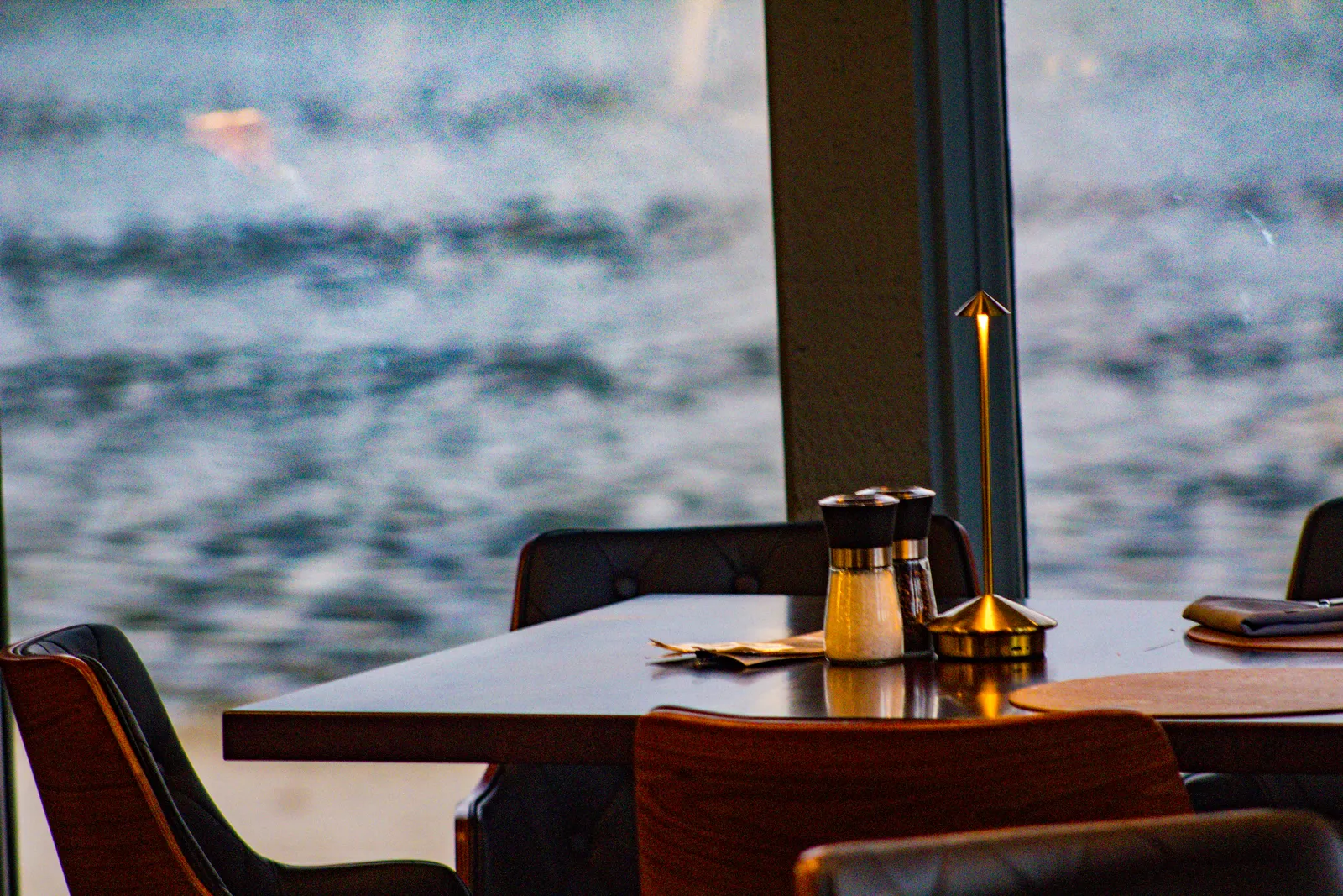 Lakeside table with gold lamp