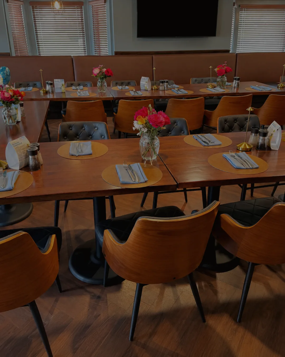 Private dining room set with fresh flowers for an event